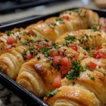 Flaky crescent roll breakfast recipes served on a plate